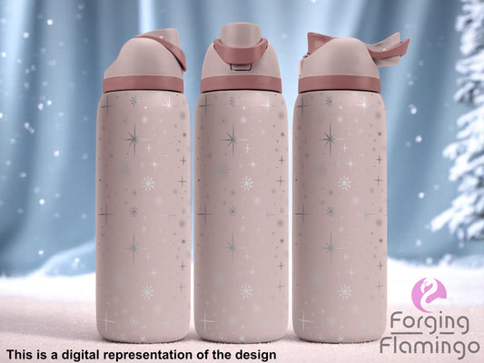 Three blush pink tumblers with flip-top lids, engraved with a scattered pattern of mid-century modern starbursts and sparkles, displayed against a snowy winter backdrop with frosted trees and falling snow. Text below reads “This is a digital representation of the design.”