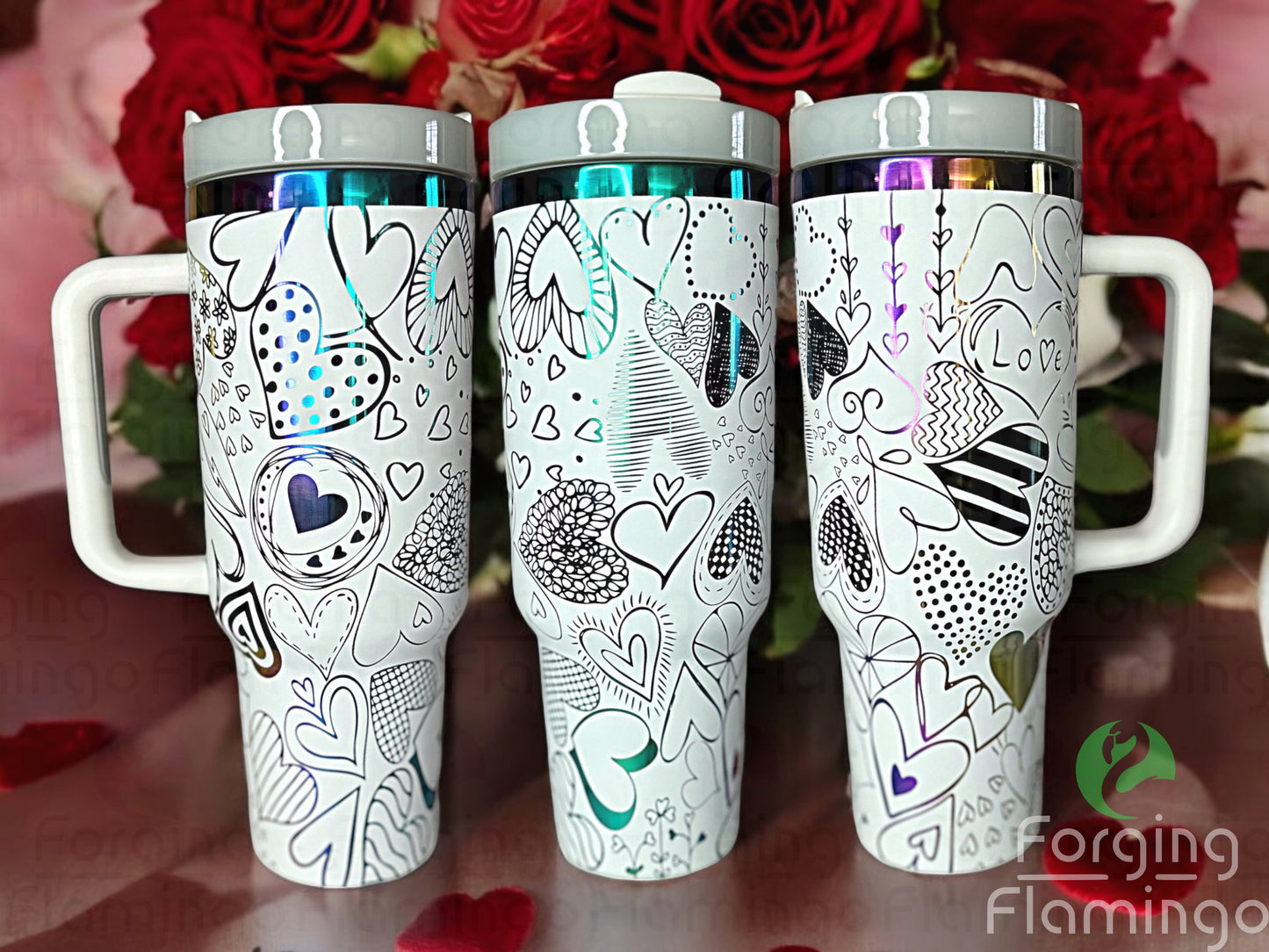 Composite image of a single white tumbler with a rainbow base, engraved with Forging Flamingo's Heart Doodles design, shown from multiple angles to highlight whimsical heart sketches and vibrant accents in a seamless wrap.