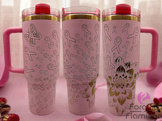 Composite image of a light pink Stanley tumbler with a gold base engraved with Forging Flamingo's Dahlia Pink Ribbon design, shown from multiple angles to emphasize the outlined breast cancer awareness ribbons and floral details in a seamless wrap.