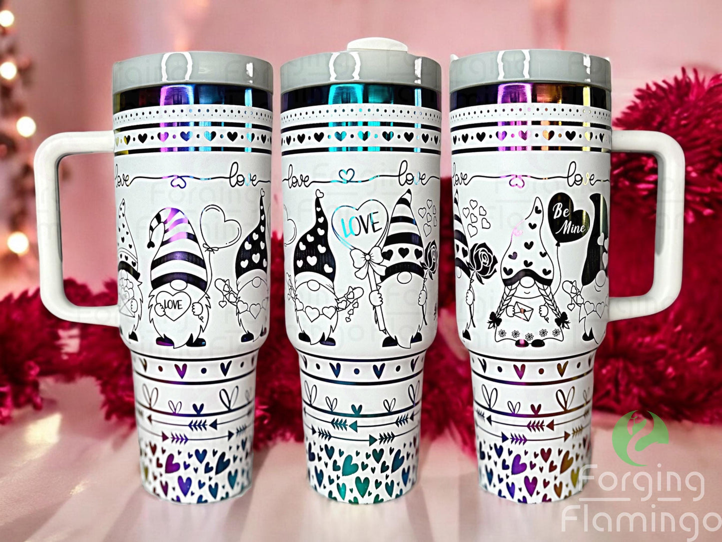 Composite image of a single Stanley tumbler engraved with Forging Flamingo's Valentine gnome design, shown from three angles to highlight the seamless wrap featuring bunny-eared gnomes, striped eggs, and pastel Easter silhouettes.