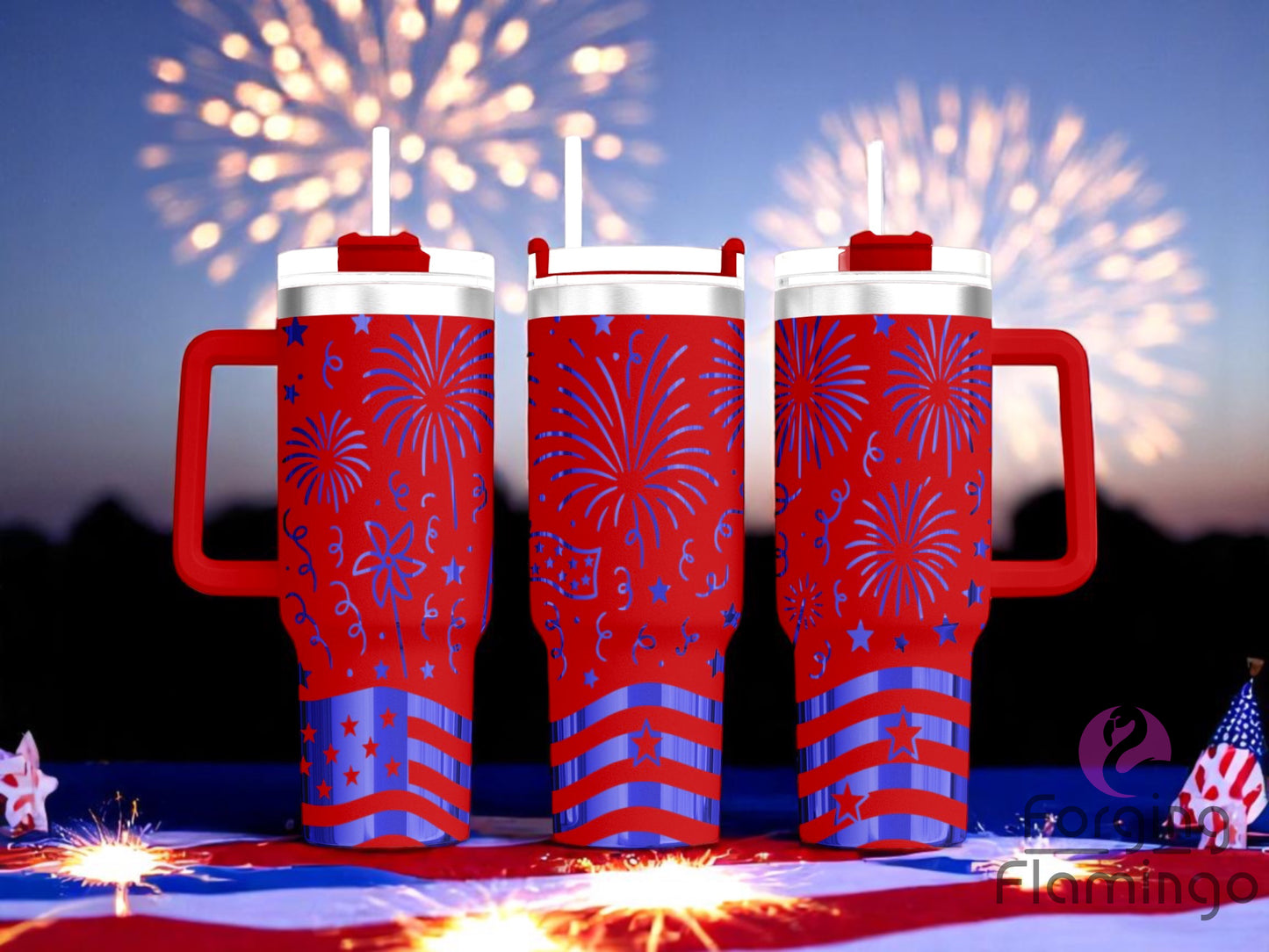 Three red tumblers with handles, engraved with 4th of July fireworks, stars, and stripes design, displayed on an American flag backdrop with fireworks in the night sky.
