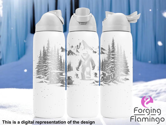 Three white tumblers with flip-top lids, engraved with a winter scene featuring a large yeti, pine trees, mountains, a snow-covered jeep, and people exploring, displayed against an icy blue snow-covered background. Text below reads “This is a digital representation of the design.”
