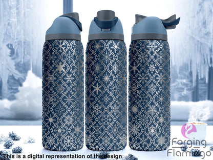 Three dark blue stainless steel tumblers with an intricate snowflake pattern laser-engraved in silver. The design consists of assorted snowflakes arranged inside a repeating quatrefoil lattice pattern, covering the entire cup. The background features a frosty, winter window scene with snow and ice, pinecones on the surface, and a cup of hot beverage with steam. Text at the bottom reads “This is a digital representation of the design.”
