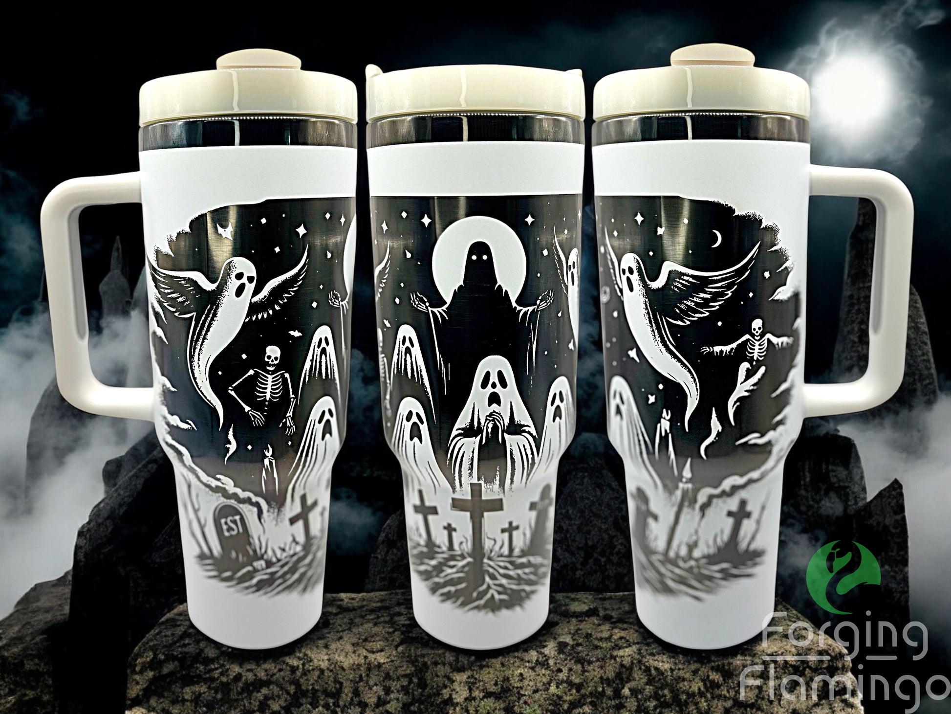 Three tumblers with ghostly illustrations on a dark background