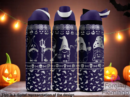 Three dark purple tumblers with flip-top lids, engraved with Halloween gnome designs, spiderwebs, jack-o'-lantern faces, skulls, crossbones, and bats, displayed against a festive Halloween background with pumpkins, string lights, and a dark wooden table. Text below reads “This is a digital representation of the design.”
