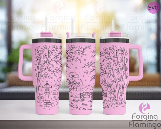 Three pink tumblers featuring a seamless Japanese Garden design with cherry blossoms, a stone lantern, and a curved bridge, displayed on a counter with a softly blurred background.