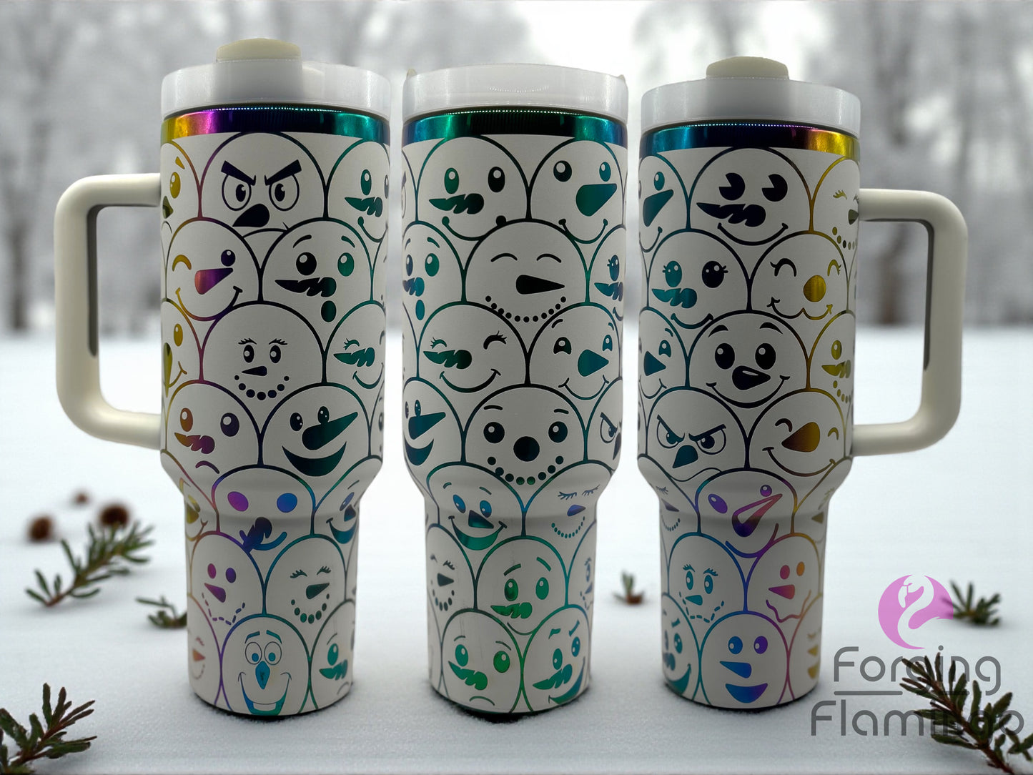 Three insulated travel mugs with ghost designs on a snowy background