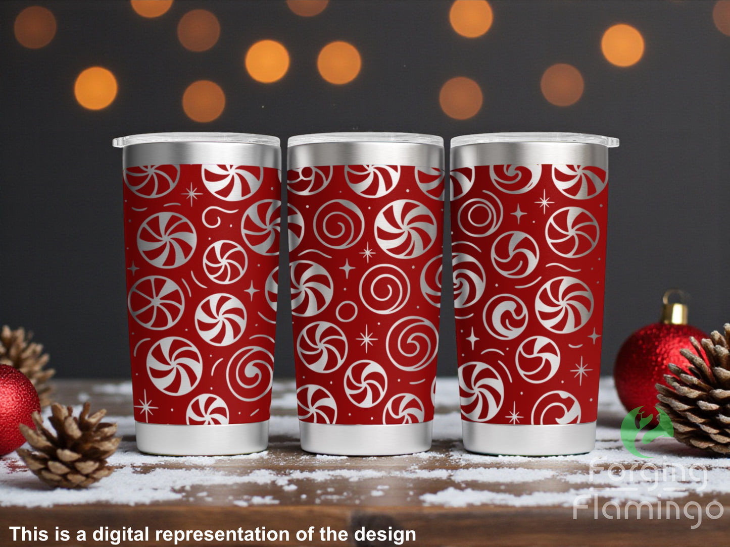 Three red tumblers with white candy cane pattern on a wooden surface with festive decorations.