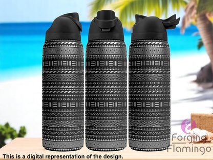 Three black tumblers with flip-top lids, engraved with tribal-inspired geometric patterns including stripes, triangles, and dots, displayed on a table against a tropical beach background with palm trees and ocean waves. Text below reads “This is a digital representation of the design.”
