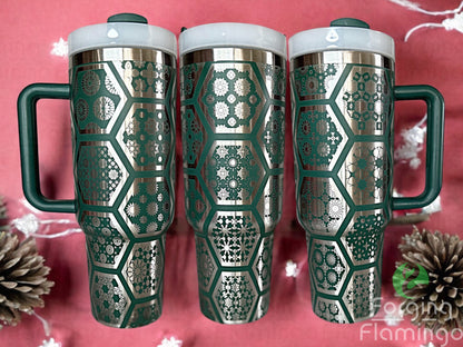 Composite image of a single tumbler engraved with Forging Flamingo's Arabesque Tiles design, shown from multiple angles to highlight detailed tile engravings with ornamental floral and geometric elements in a seamless wrap. Created using the digital file for 20oz/30oz/40oz tumblers.