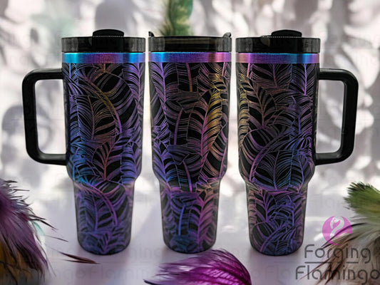 Composite image of a 40oz black tumbler with rainbow engraving, featuring Forging Flamingo's Feathers design. Shown from multiple angles to showcase intricately detailed feather patterns in a soft, flowing seamless wrap. Part of our Bargain Bin collection.