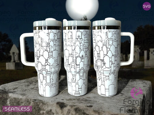 Composite image of a 40oz white tumbler with onyx engraving, featuring Forging Flamingo's Graveyard design. Displayed from multiple angles to showcase haunted trees, tombstones, bats, and spooky silhouettes in a seamless Halloween wrap. Part of our Bargain Bin collection.