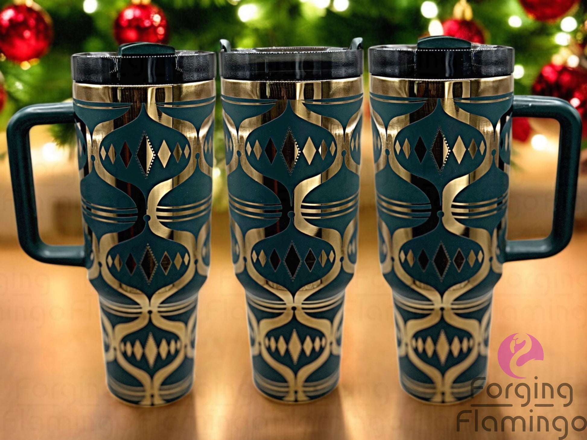 Composite image of a 40oz green tumbler with gold engraving, featuring Forging Flamingo's Teardrop Ornament design. Displayed from multiple angles to showcase geometric holiday ornaments and festive details in a seamless seasonal wrap. Part of our Bargain Bin collection.