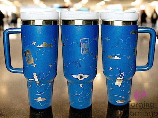 Composite image of a single tumbler engraved with Forging Flamingo's Flight Attendant design, shown from multiple angles to showcase aviation icons like airplanes, wings, and travel stamps in a seamless wrap. Created using the digital file for 20oz/30oz/40oz tumblers.