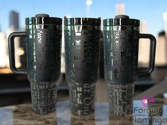 Composite image of a single tumbler engraved with Forging Flamingo's ''F*ck You, Oh F*ck!, F*ck Me'' design, shown from multiple angles to highlight bold, expressive profanity in playful fonts and cheeky flair in a seamless wrap.