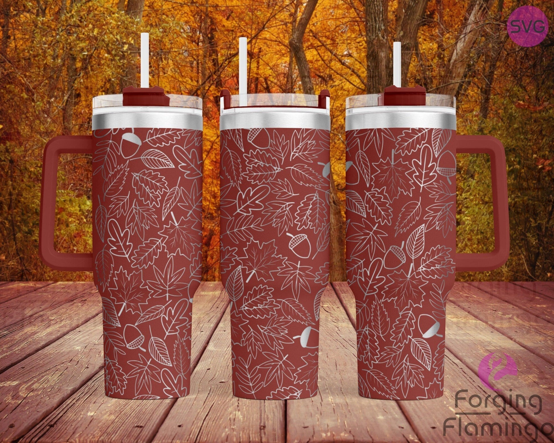 Mockup image of the Leaves & Acorns Tumbler Wrap SVG by Forging Flamingo, displayed on three tumblers featuring scattered autumn leaves, acorns, and branches in a seamless nature-inspired pattern. Digital design shown for 20oz, 30oz, and 40oz tumblers.