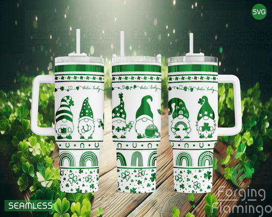 Mockup image of the Lucky Gnomes Tumbler Wrap SVG by Forging Flamingo, displayed on three tumblers featuring festive gnome characters, shamrocks, rainbows, and pots of gold in a seamless St. Patrick's Day wrap. Digital design shown for 20oz, 30oz, and 40oz tumblers.