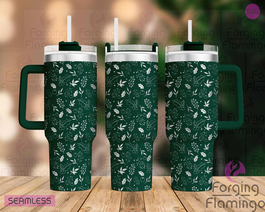 Mockup image of the Mistletoe & Holly Tumbler Wrap SVG by Forging Flamingo, displayed on three tumblers featuring engraved sprigs of mistletoe, holly leaves, and berries in a seamless winter greenery wrap. Digital design shown for 20oz, 30oz, and 40oz tumblers.