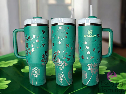 Composite image of a single Non-Branded tumbler engraved with Forging Flamingo's Clover Dandelion design, shown from multiple angles to highlight engraved clovers, dandelion puffs, and drifting seeds in a seamless, nature-inspired wrap.