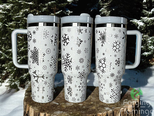 Composite image of a single Non-Branded fog tumbler engraved with Forging Flamingo's Snowflakes design, shown from multiple angles to highlight delicate snowflakes in a seamless winter-themed wrap.