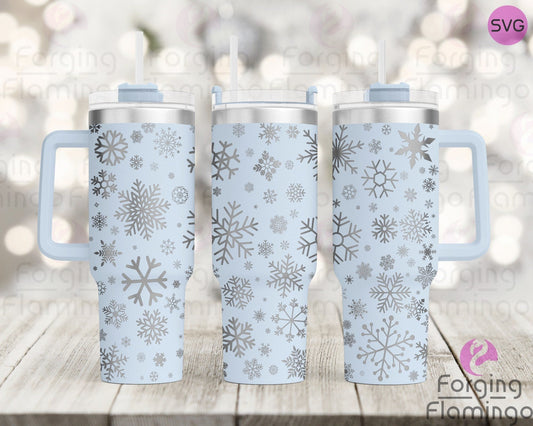 Mockup image of the Snowflakes Tumbler Wrap SVG by Forging Flamingo, displayed on three tumblers featuring intricately detailed snowflakes scattered across a seamless winter-themed wrap. Digital design shown for 20oz, 30oz, and 40oz tumblers.