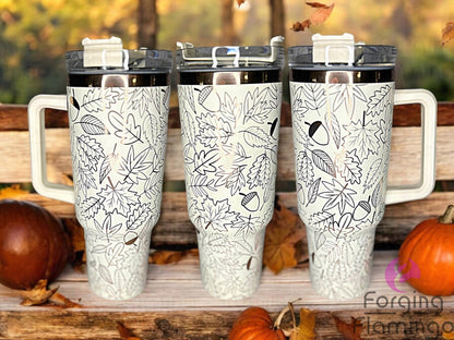 Composite image of a single Stanley tumbler engraved with Forging Flamingo's Leaves & Acorns design, shown from multiple angles to highlight falling autumn leaves, acorns, and seasonal foliage in a seamless wrap perfect for fall.