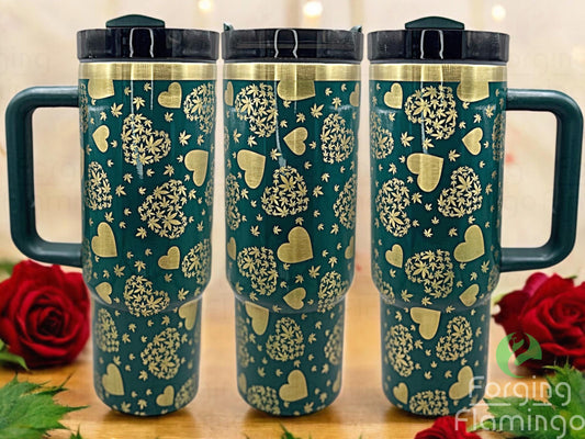 Composite image of a single Stanley tumbler engraved with Forging Flamingo's Pot Love design, shown from multiple angles to highlight cannabis leaves arranged in heart shapes and playful weed-themed engravings in a seamless wrap.