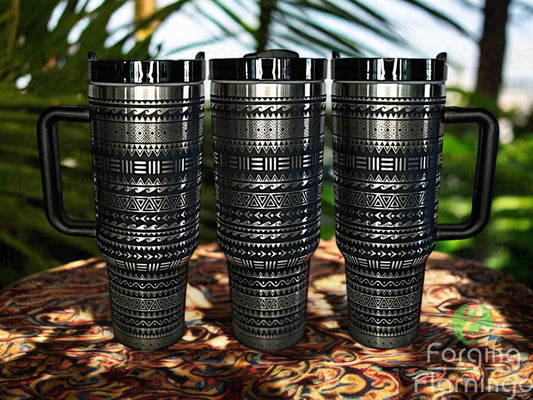 Composite image of a single tumbler engraved with Forging Flamingo's Tribal design, shown from multiple angles to showcase sharp geometric elements and traditional tribal patterning in a seamless wrap. Created using the digital file for 20oz/30oz/40oz tumblers.